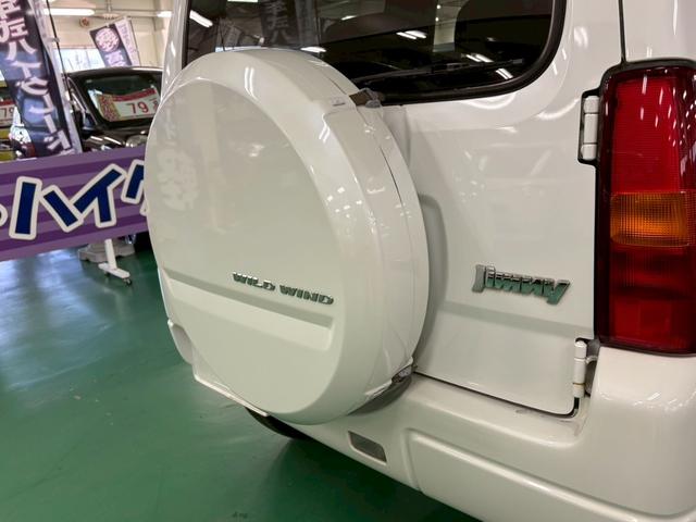 ジムニー ワイルドウインド 4WD ターボ車 フロア4速AT 社外7インチナビ D席シートヒーター ABS エアコン パワステ パワーウィンドウ Wエアバッグ 電動格納ミラー 純正アルミ(30枚目)