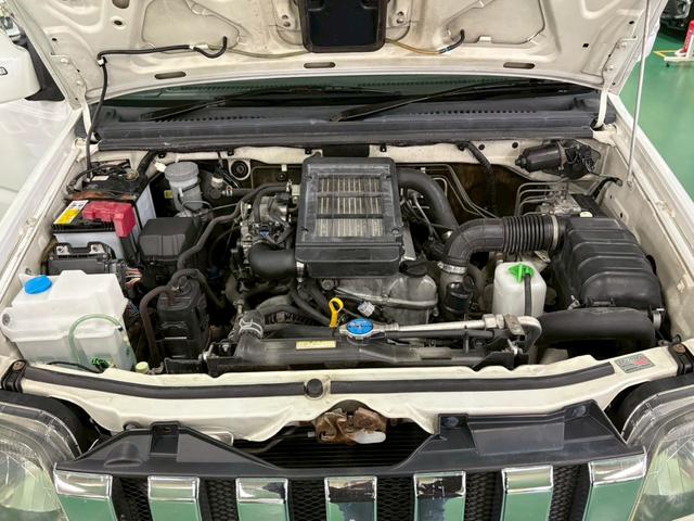 ジムニー ワイルドウインド 4WD ターボ車 フロア4速AT 社外7インチナビ D席シートヒーター ABS エアコン パワステ パワーウィンドウ Wエアバッグ 電動格納ミラー 純正アルミ(32枚目)