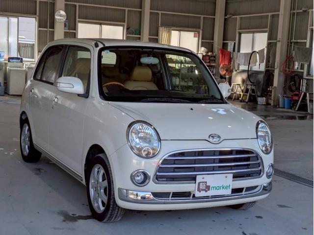 ミラジーノ プレミアムX 社外フルセグナビ Bluetooth フロア4速AT ハーフレザーシート オートエアコン ABS キーレスエントリー 盗難警報装置 パワステ パワーウィンドウ Wエアバッグ 電動格納ミラー 純正アルミ(13枚目)