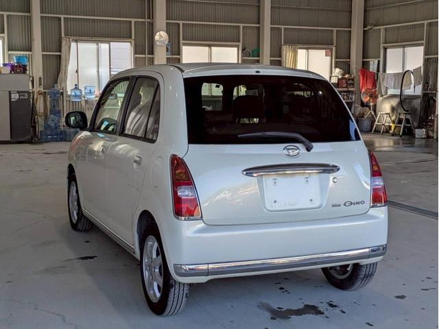 ミラジーノ プレミアムX 社外フルセグナビ Bluetooth フロア4速AT ハーフレザーシート オートエアコン ABS キーレスエントリー 盗難警報装置 パワステ パワーウィンドウ Wエアバッグ 電動格納ミラー 純正アルミ(14枚目)