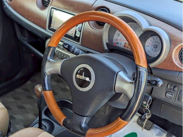 ミラジーノ プレミアムX 社外フルセグナビ Bluetooth フロア4速AT ハーフレザーシート オートエアコン ABS キーレスエントリー 盗難警報装置 パワステ パワーウィンドウ Wエアバッグ 電動格納ミラー 純正アルミ(20枚目)