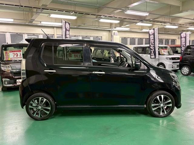 ワゴンＲ ２０周年記念車　社外メモリーナビ　レーダーブレーキサポート　横滑り防止装置　アイドリングストップ　オートエアコン　Ｄ席シートヒーター　ＡＢＳ　ＨＩＤヘッドライト　Ｐスタート　スマートキー　盗難警報装置　純正アルミ（12枚目）