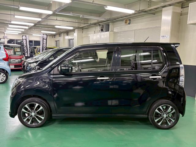 ワゴンＲ ２０周年記念車　社外メモリーナビ　レーダーブレーキサポート　横滑り防止装置　アイドリングストップ　オートエアコン　Ｄ席シートヒーター　ＡＢＳ　ＨＩＤヘッドライト　Ｐスタート　スマートキー　盗難警報装置　純正アルミ（13枚目）