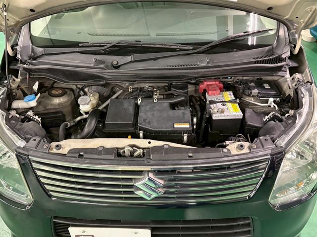 ワゴンＲ ２０周年記念車　社外メモリーナビ　レーダーブレーキサポート　横滑り防止装置　アイドリングストップ　オートエアコン　Ｄ席シートヒーター　ＡＢＳ　ＨＩＤヘッドライト　Ｐスタート　スマートキー　盗難警報装置　純正アルミ（32枚目）