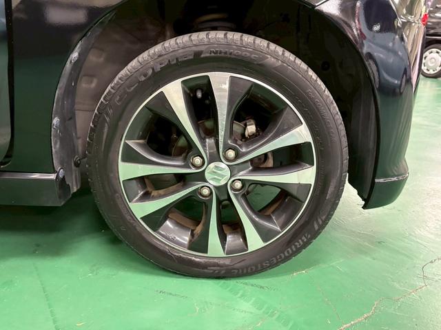 ワゴンＲ ２０周年記念車　社外メモリーナビ　レーダーブレーキサポート　横滑り防止装置　アイドリングストップ　オートエアコン　Ｄ席シートヒーター　ＡＢＳ　ＨＩＤヘッドライト　Ｐスタート　スマートキー　盗難警報装置　純正アルミ（33枚目）