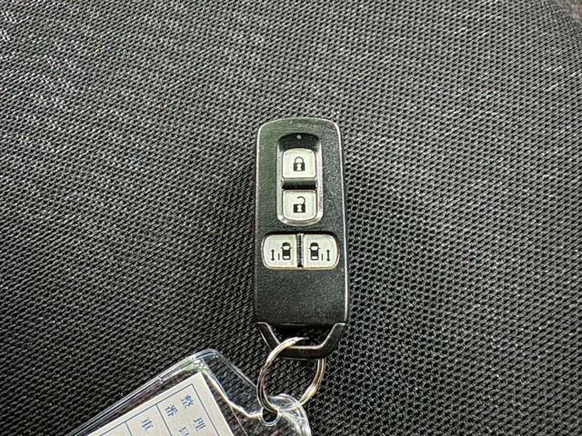 N-BOXカスタム G・Lパッケージ 純正ナビ バックモニター 両側パワースライドドア 横滑り防止装置 アイドリングストップ オートエアコン ABS HIDヘッドライト プッシュスタート スマートキー 盗難警報装置 純正アルミ ETC付き(27枚目)