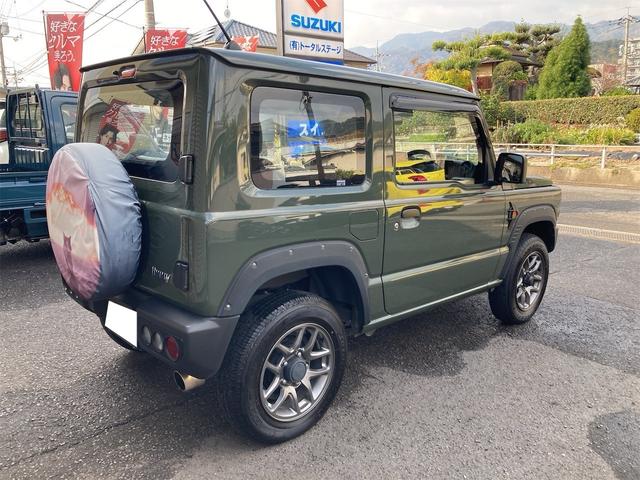 ジムニー ＸＧ　衝突被害軽減システム　ＥＴＣ　車線逸脱警報　エアコン　オートライト　Ｂｌｕｅｔｏｏｔｈ　８型ナビ　ＴＶワンセグ　皮調シートカバー　ＸＣ用アルミホイール　ドライブレコーダー　ヘッドライトカバー（9枚目）