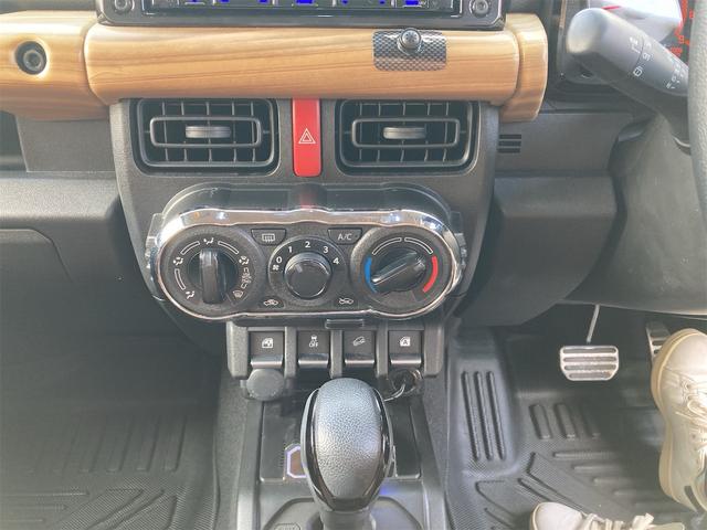 ジムニー ＸＧ　衝突被害軽減システム　ＥＴＣ　車線逸脱警報　エアコン　オートライト　Ｂｌｕｅｔｏｏｔｈ　８型ナビ　ＴＶワンセグ　皮調シートカバー　ＸＣ用アルミホイール　ドライブレコーダー　ヘッドライトカバー（22枚目）