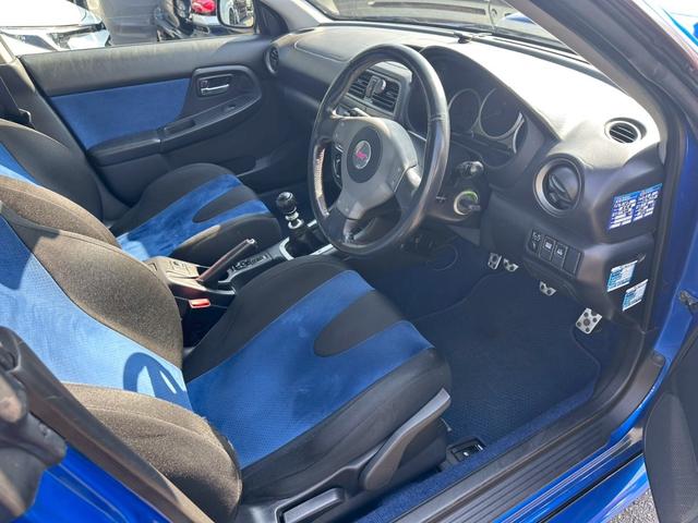 インプレッサ ＷＲＸ　ＳＴｉ　４ＷＤ　６速ＭＴ　ＳＴｉマフラー　リミッターカット　ＥＴＣ　ナビ　アルミホイール　キーレスエントリー　電動格納ミラー　衝突安全ボディ　ＡＢＳ　エアコン　パワーステアリング　パワーウィンドウ（8枚目）