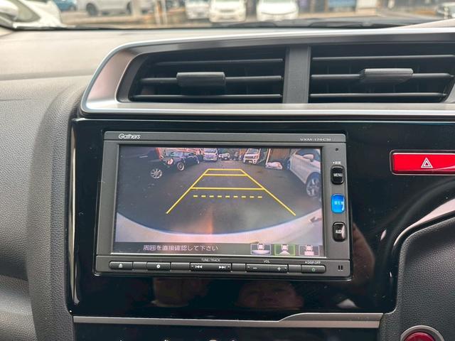 フィット １３Ｇ・Ｆパッケージ　ファインエディション　４ＷＤ　ＥＴＣ　バックカメラ　ナビ　ＴＶ　アルミホイール　スマートキー　アイドリングストップ　シートヒーター　フルフラット　ＣＶＴ　盗難防止システム　衝突安全ボディ　ＡＢＳ　ＥＳＣ（5枚目）