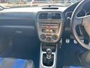 インプレッサ ＷＲＸ　ＳＴｉ　４ＷＤ　６速ＭＴ　ＳＴｉマフラー　リミッターカット　ＥＴＣ　ナビ　アルミホイール　キーレスエントリー　電動格納ミラー　衝突安全ボディ　ＡＢＳ　エアコン　パワーステアリング　パワーウィンドウ（4枚目）