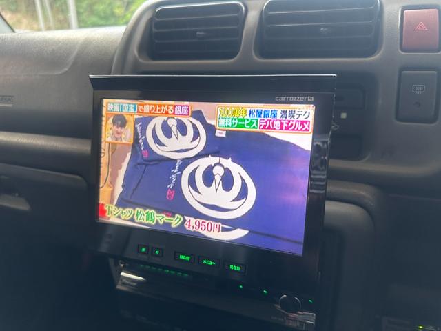 ジムニー ワイルドウインド　ルーフキャリア　ＥＴＣ　専用カバー付き背面タイヤ　フォグランプ　シートヒーター　ターボ　ミラーヒーター　４速ＡＴ　キーレス　ナビ　フルセグＴＶ　純正１６インチアルミホイール（3枚目）