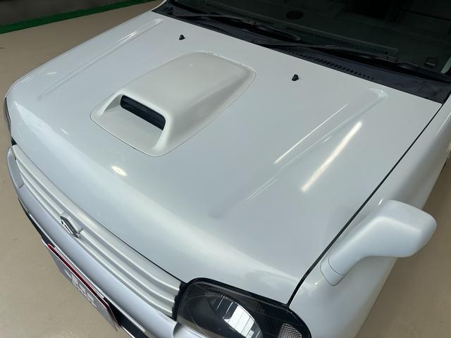 ジムニー ワイルドウインド　ルーフキャリア　ＥＴＣ　専用カバー付き背面タイヤ　フォグランプ　シートヒーター　ターボ　ミラーヒーター　４速ＡＴ　キーレス　ナビ　フルセグＴＶ　純正１６インチアルミホイール（59枚目）