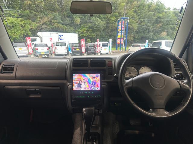 ジムニー ワイルドウインド　ルーフキャリア　ＥＴＣ　専用カバー付き背面タイヤ　フォグランプ　シートヒーター　ターボ　ミラーヒーター　４速ＡＴ　キーレス　ナビ　フルセグＴＶ　純正１６インチアルミホイール（2枚目）