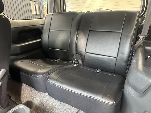 ジムニー ワイルドウインド　ルーフキャリア　ＥＴＣ　専用カバー付き背面タイヤ　フォグランプ　シートヒーター　ターボ　ミラーヒーター　４速ＡＴ　キーレス　ナビ　フルセグＴＶ　純正１６インチアルミホイール（7枚目）