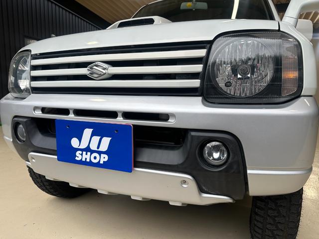 ジムニー ワイルドウインド　ルーフキャリア　ＥＴＣ　専用カバー付き背面タイヤ　フォグランプ　シートヒーター　ターボ　ミラーヒーター　４速ＡＴ　キーレス　ナビ　フルセグＴＶ　純正１６インチアルミホイール（16枚目）