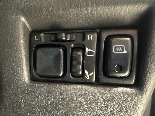 ジムニー ワイルドウインド　ルーフキャリア　ＥＴＣ　専用カバー付き背面タイヤ　フォグランプ　シートヒーター　ターボ　ミラーヒーター　４速ＡＴ　キーレス　ナビ　フルセグＴＶ　純正１６インチアルミホイール（18枚目）