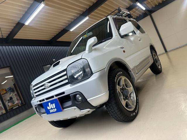 ジムニー ワイルドウインド　ルーフキャリア　ＥＴＣ　専用カバー付き背面タイヤ　フォグランプ　シートヒーター　ターボ　ミラーヒーター　４速ＡＴ　キーレス　ナビ　フルセグＴＶ　純正１６インチアルミホイール（34枚目）