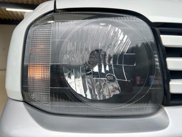 ジムニー ワイルドウインド　ルーフキャリア　ＥＴＣ　専用カバー付き背面タイヤ　フォグランプ　シートヒーター　ターボ　ミラーヒーター　４速ＡＴ　キーレス　ナビ　フルセグＴＶ　純正１６インチアルミホイール（42枚目）