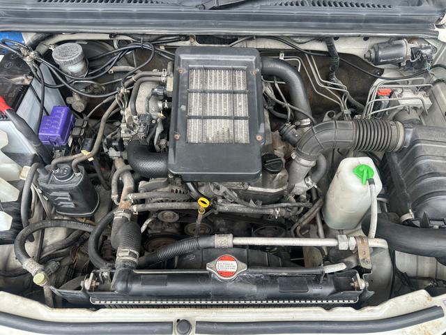 ジムニー ワイルドウインド　ルーフキャリア　ＥＴＣ　専用カバー付き背面タイヤ　フォグランプ　シートヒーター　ターボ　ミラーヒーター　４速ＡＴ　キーレス　ナビ　フルセグＴＶ　純正１６インチアルミホイール（43枚目）