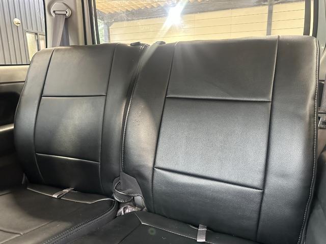 ジムニー ワイルドウインド　ルーフキャリア　ＥＴＣ　専用カバー付き背面タイヤ　フォグランプ　シートヒーター　ターボ　ミラーヒーター　４速ＡＴ　キーレス　ナビ　フルセグＴＶ　純正１６インチアルミホイール（51枚目）