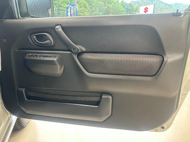 ジムニー ワイルドウインド　ルーフキャリア　ＥＴＣ　専用カバー付き背面タイヤ　フォグランプ　シートヒーター　ターボ　ミラーヒーター　４速ＡＴ　キーレス　ナビ　フルセグＴＶ　純正１６インチアルミホイール（59枚目）