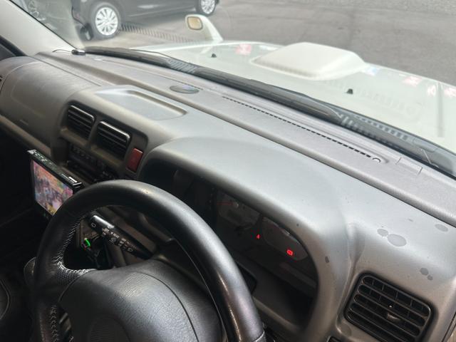 ジムニー ワイルドウインド　ルーフキャリア　ＥＴＣ　専用カバー付き背面タイヤ　フォグランプ　シートヒーター　ターボ　ミラーヒーター　４速ＡＴ　キーレス　ナビ　フルセグＴＶ　純正１６インチアルミホイール（60枚目）