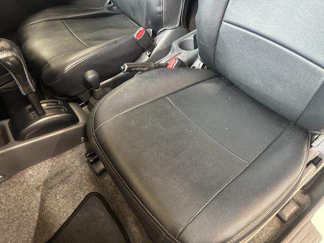 ジムニー ワイルドウインド　ルーフキャリア　ＥＴＣ　専用カバー付き背面タイヤ　フォグランプ　シートヒーター　ターボ　ミラーヒーター　４速ＡＴ　キーレス　ナビ　フルセグＴＶ　純正１６インチアルミホイール（61枚目）