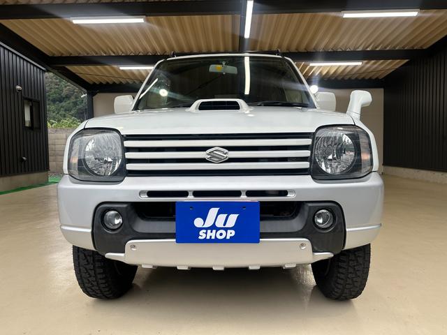 ジムニー ワイルドウインド　ルーフキャリア　ＥＴＣ　専用カバー付き背面タイヤ　フォグランプ　シートヒーター　ターボ　ミラーヒーター　４速ＡＴ　キーレス　ナビ　フルセグＴＶ　純正１６インチアルミホイール（66枚目）