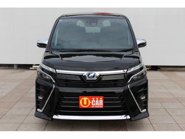 ヴォクシー ハイブリッドＺＳ　煌ＩＩ　禁煙車　純正９インチナビ　フルセグＴＶ　Ｂｌｕｅｔｏｏｔｈ　バックカメラ　前席左右シートヒーター　シートバックテーブル　クルーズコントロール　ＥＴＣ　ドラレコ　ＬＥＤヘッドライト　７人乗り（2枚目）
