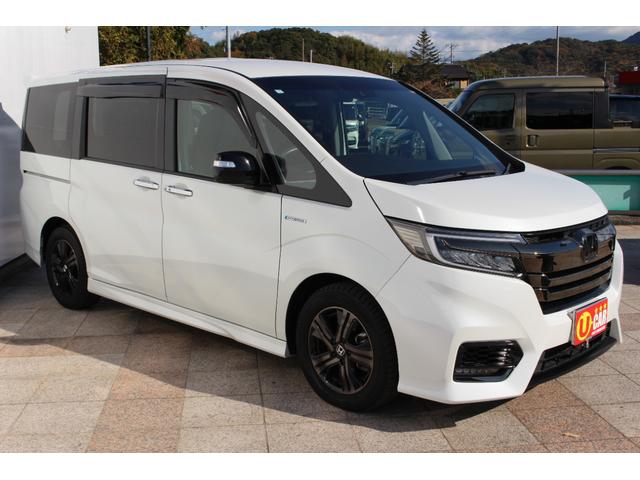 ステップワゴンスパーダ スパーダハイブリッドＧ・ＥＸホンダセンシングブラスタ　禁煙車　純正１０インチナビ　Ｂｌｕｅｔｏｏｔｈ　ＤＶＤ　フルセグＴＶ　バックカメラ　サイド＆カーテンエアバック　ＢＬＡＣＫＳＴＹＬＥ専用１６インチアルミ＆専用エクステリア　運転席＆助手席シートヒーター（12枚目）