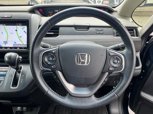 フリード G・ホンダセンシング☆ナビ☆Wパワスラ☆Bカメラ☆試乗OK☆ 純正8インチナビ☆フリップダウンモニター☆バックカメラ☆両側パワースライドドア☆LEDライト☆ハーフレザーシート☆シートヒーター☆ETC☆ホンダセンシング☆アダプティブクルーズC☆15AW☆試乗OK(7枚目)