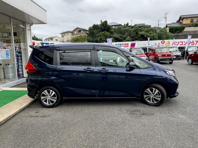 フリード G・ホンダセンシング☆ナビ☆Wパワスラ☆Bカメラ☆試乗OK☆ 純正8インチナビ☆フリップダウンモニター☆バックカメラ☆両側パワースライドドア☆LEDライト☆ハーフレザーシート☆シートヒーター☆ETC☆ホンダセンシング☆アダプティブクルーズC☆15AW☆試乗OK(53枚目)