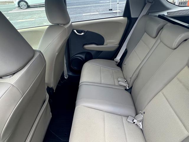 フィットシャトルハイブリッド ハイブリッド・ナビプレミアムセレクション☆HID☆試乗OK☆ 純正HDDナビ☆バックカメラ☆スマートキー☆HIDオートライト☆ハーフレザーシート☆クルーズコントロール☆オートエアコン☆ビルトインETC☆電動格納ミラー☆横滑り防止装置☆走行5.3万K☆試乗OK(66枚目)