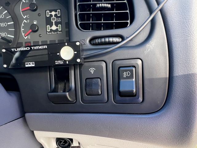 デリカスペースギア ロング スーパーエクシード☆メモリーナビ☆ETC☆試乗OK☆ ディーゼルターボ☆切替4WD☆クリスタルライトルーフ☆オートステップ☆メモリーナビ☆バックカメラ☆キーレス☆ETC☆JAOSカンガルーバー☆リアラダー☆オートエアコン☆オープンカントリー☆試乗OK(21枚目)