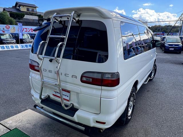 デリカスペースギア ロング スーパーエクシード☆メモリーナビ☆ETC☆試乗OK☆ ディーゼルターボ☆切替4WD☆クリスタルライトルーフ☆オートステップ☆メモリーナビ☆バックカメラ☆キーレス☆ETC☆JAOSカンガルーバー☆リアラダー☆オートエアコン☆オープンカントリー☆試乗OK(62枚目)