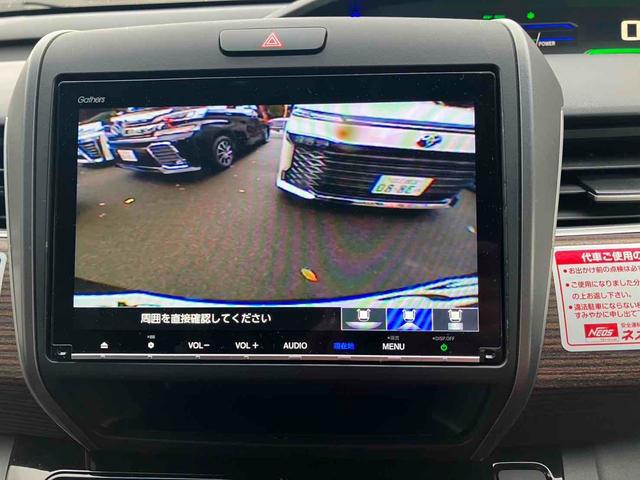 フリードハイブリッド ハイブリッド・クロスターホンダセンシング ETC バックカメラ ナビ TV オートクルーズコントロール レーンアシスト 衝突被害軽減システム 両側電動スライドドア LEDヘッドランプ スマートキー 電動格納ミラー シートヒーター 3列シート(4枚目)