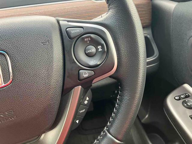 フリードハイブリッド ハイブリッド・クロスターホンダセンシング ETC バックカメラ ナビ TV オートクルーズコントロール レーンアシスト 衝突被害軽減システム 両側電動スライドドア LEDヘッドランプ スマートキー 電動格納ミラー シートヒーター 3列シート(10枚目)