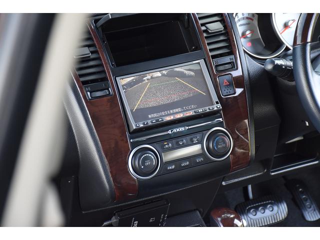 ティーダ アクシス　黒本革仕様　純正ナビ　バックカメラ　地デジ　ＤＶＤ　Ｂｌｕｅｔｏｏｔｈ　ディーラー下取車両　ＥＴＣ　ウッドコンビ革巻ハンドル　専用ウッドパーツ　アクシスＡＷ　マット　バイザー　フォグランプ　スマートキー　黒本革（19枚目）