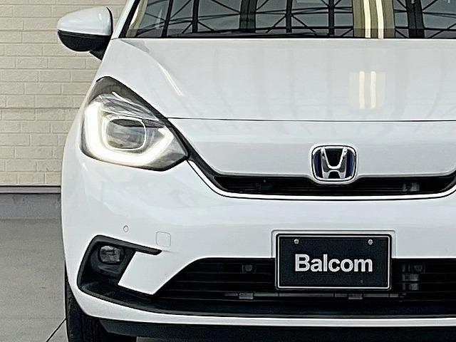 フィット ｅ：ＨＥＶネス　ホンダセンシング　衝突軽減ブレーキ　アダプティブクルーズコントロール　誤発進後方誤発進抑制機能　車線維持支援システム　路外逸脱制御機能　近距離衝突軽減ブレーキ　オートハイビーム　標識認識機能（8枚目）