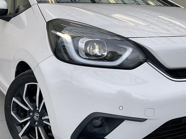 フィット ｅ：ＨＥＶネス　ホンダセンシング　衝突軽減ブレーキ　アダプティブクルーズコントロール　誤発進後方誤発進抑制機能　車線維持支援システム　路外逸脱制御機能　近距離衝突軽減ブレーキ　オートハイビーム　標識認識機能（23枚目）