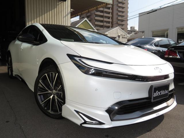 プリウス Ｚ　１２．３ＤＡ　フルセグＴＶ　パノラミックビューモニター　チームメイト　アドバンストパーク　デジタルインナーミラー　モデリスタエアロ　パノラマルーフ　パワーバックドア　おくだけ充電　ＥＴＣ２．０（3枚目）