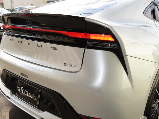 プリウス Ｚ　１２．３ＤＡ　フルセグＴＶ　パノラミックビューモニター　チームメイト　アドバンストパーク　デジタルインナーミラー　モデリスタエアロ　パノラマルーフ　パワーバックドア　おくだけ充電　ＥＴＣ２．０（18枚目）
