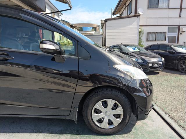 フリード ＧＨ　禁煙車＼純正９インチナビ＼地デジ＼バックカメラ＼スマートキー＼オートライト＼パワースライドドア＼ＥＴＣ車載器＼革調シートカバー＼１年保証（50枚目）