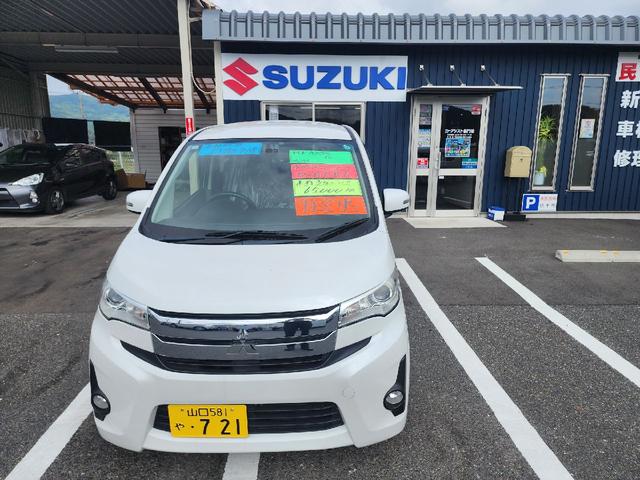 ｅＫカスタム Ｇ　ＥＴＣ　ＨＩＤ　スマートキー　アイドリングストップ　電動格納ミラー　ベンチシート　ＣＶＴ　盗難防止システム　ＡＢＳ　ＣＤ　ミュージックプレイヤー接続可　アルミホイール　衝突安全ボディ　エアコン（14枚目）