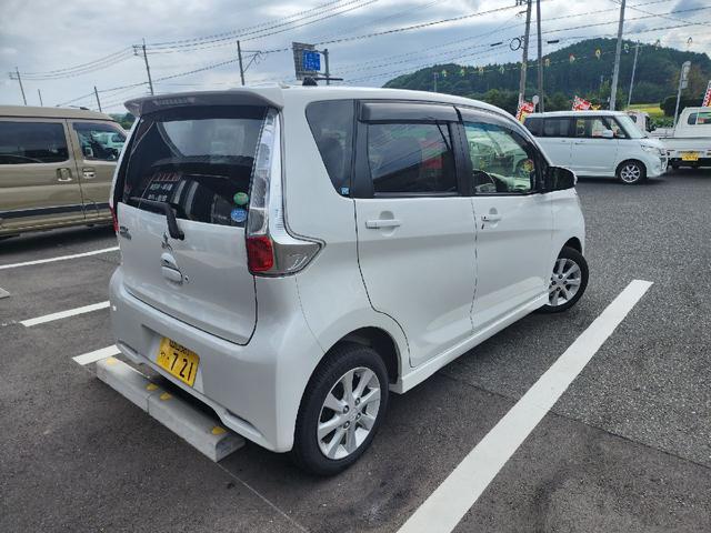 ｅＫカスタム Ｇ　ＥＴＣ　ＨＩＤ　スマートキー　アイドリングストップ　電動格納ミラー　ベンチシート　ＣＶＴ　盗難防止システム　ＡＢＳ　ＣＤ　ミュージックプレイヤー接続可　アルミホイール　衝突安全ボディ　エアコン（16枚目）