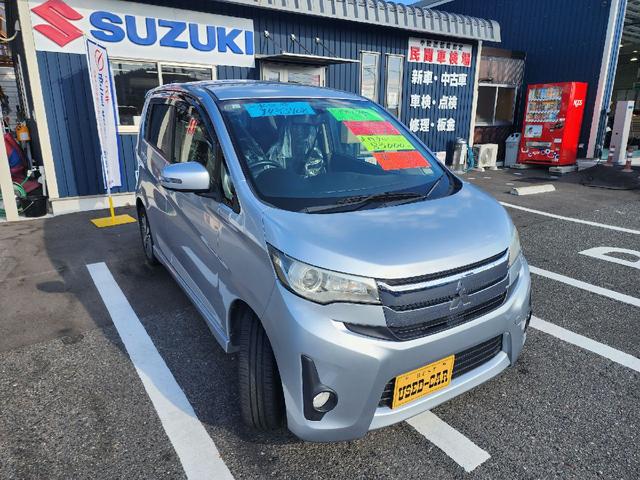 eKカスタム T ETC バックカメラ ナビ TV オートライト HID スマートキー 電動格納ミラー ベンチシート CVT 盗難防止システム ABS CD USB ミュージックプレイヤー接続可 アルミホイール(13枚目)