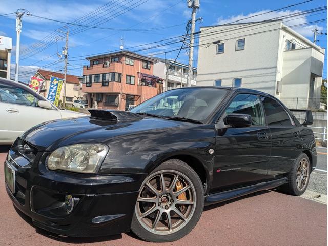 インプレッサ WRX STi 6速ミッション/4WD/ローダウン/鍛造ホイール/ブルートゥース対応ナビ/社外メーター/フジツボマフラー(7枚目)