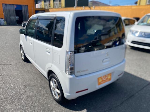 ｅＫワゴン ＭＸ　ナビ　ＴＶ　キーレスエントリー　電動格納ミラー　ベンチシート　ＡＴ　盗難防止システム　ＣＤ　ＤＶＤ再生　ＵＳＢ　アルミホイール　衝突安全ボディ　エアコン　パワーステアリング　パワーウィンドウ（16枚目）