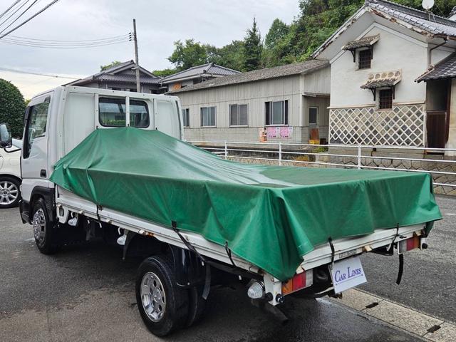 タイタンダッシュ ロングワイドローＤＸ　５速ミッション　メッキバンパー付　３人乗り　外装現状渡し　積載量１５００ｋｇ　ディーゼル車　パワステ　ＰＷ　エアコン　運転席キーレス付　ＥＴＣ　電動ミラー　３方開　ルームクリーニング済　純正バンパー有（8枚目）